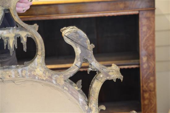 A fine George III Chippendale carved and giltwood wall mirror, H.3ft 11in. W.5ft 4in.